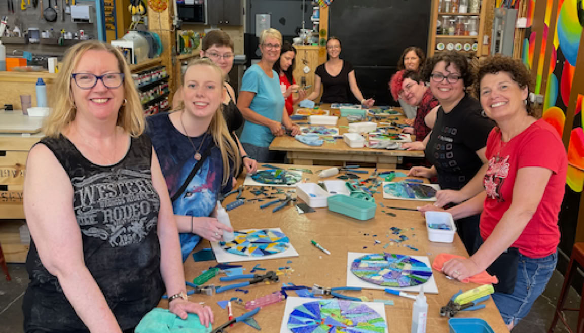 adults in fused glass workshop
